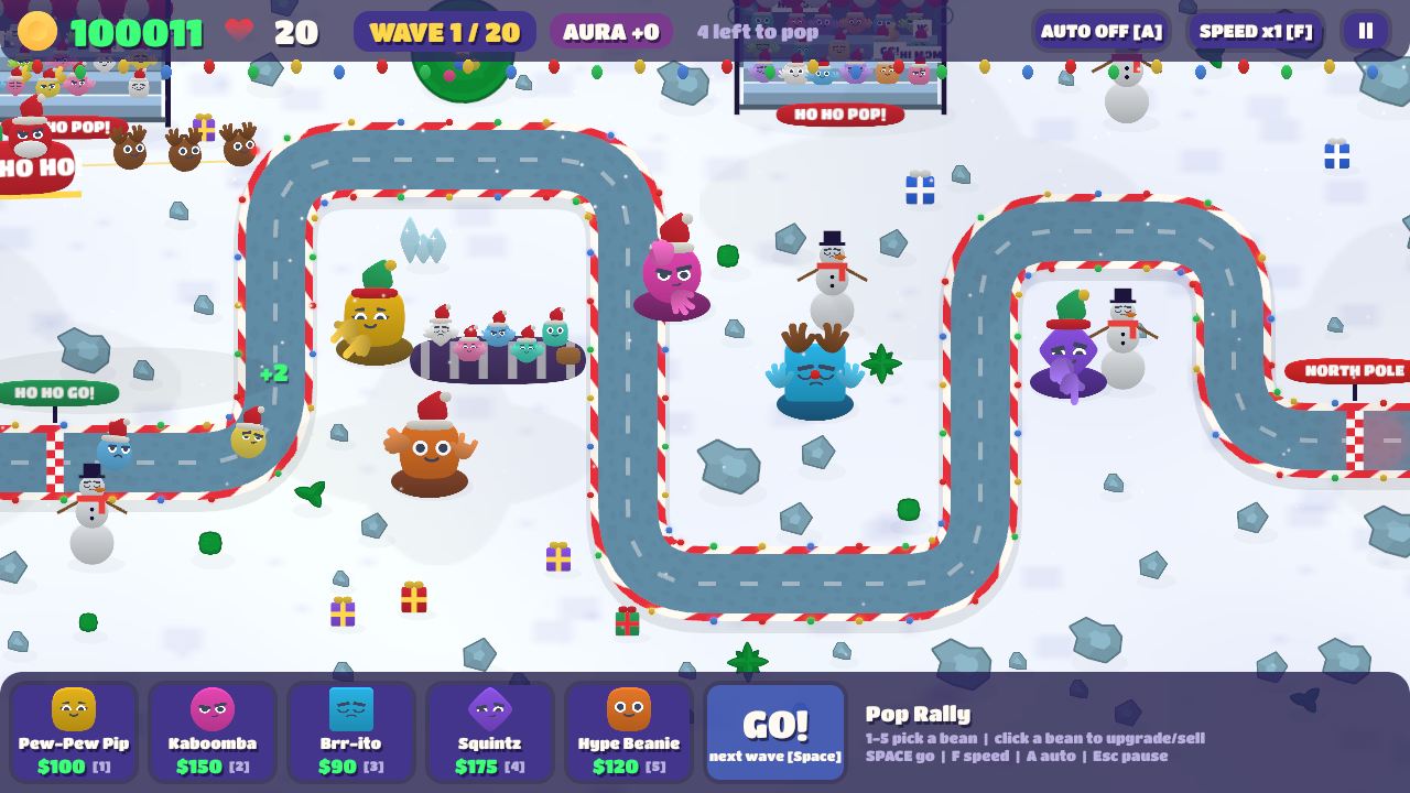 Frosty Peaks in Christmas mode: snow, candy-cane track edges, presents, snowmen and towers in festive hats.